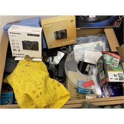 Large quantity of camera equipment in three boxes - Lumix GX1 camera, Canon EOS 500 camera, Lumix FZ100 camera, Pantax  MZ5n, various other cameras, Swift spotting Scope 20 x 60 in box,  Maxtor hard drive, three tripods, Kodak carousel projector, Pradolux slide projector, a selection of camera bags and other camera equipment. 