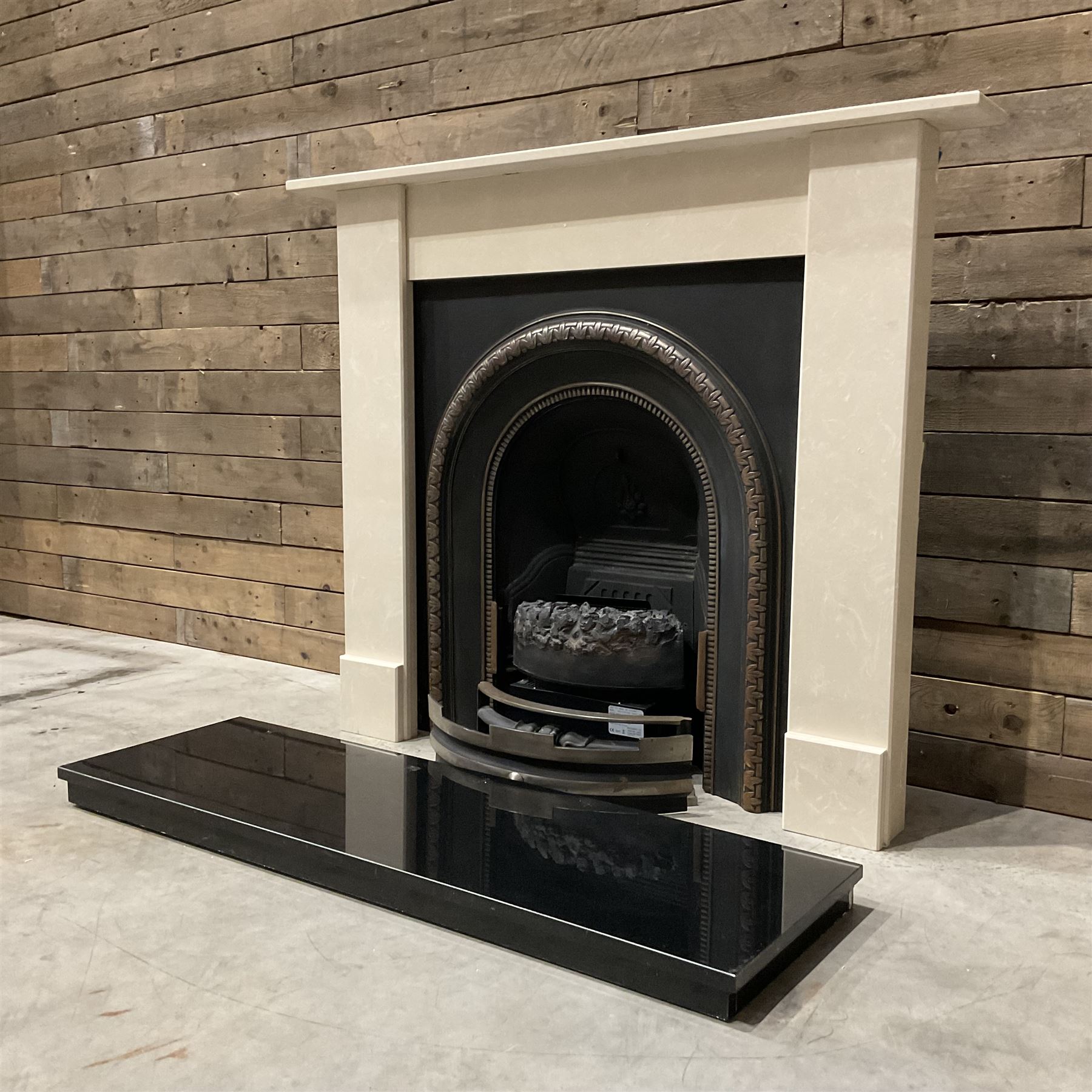 Aurora Dorchester Black Fire suite - granite style surround with cast iron insert, electric fire with remote and black hearth