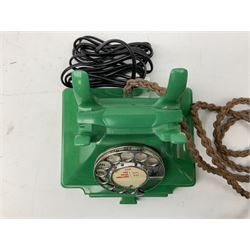 Jade green Bakelite telephone, of pyramid form with alphabet dial, brown braided handset cord and a base draw