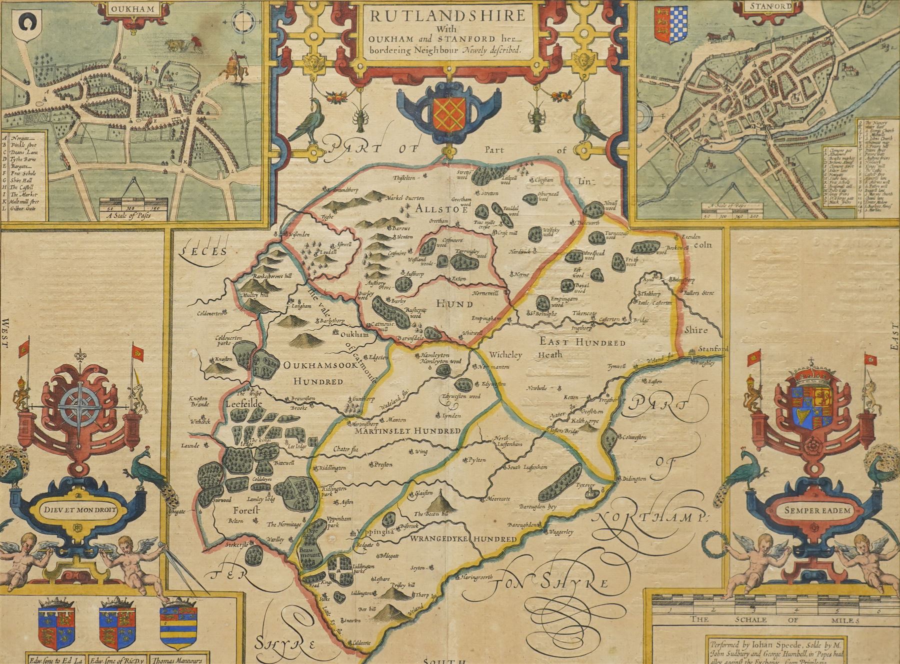 John Speed (British 1552-1629): 'Rutlandshire', 17th century engraved map with hand-colouring with inset plans of Oukham (Oakham) and Stanford and numerous armorials, English text verso pub. c.1627-1632, 40cm x 52cm