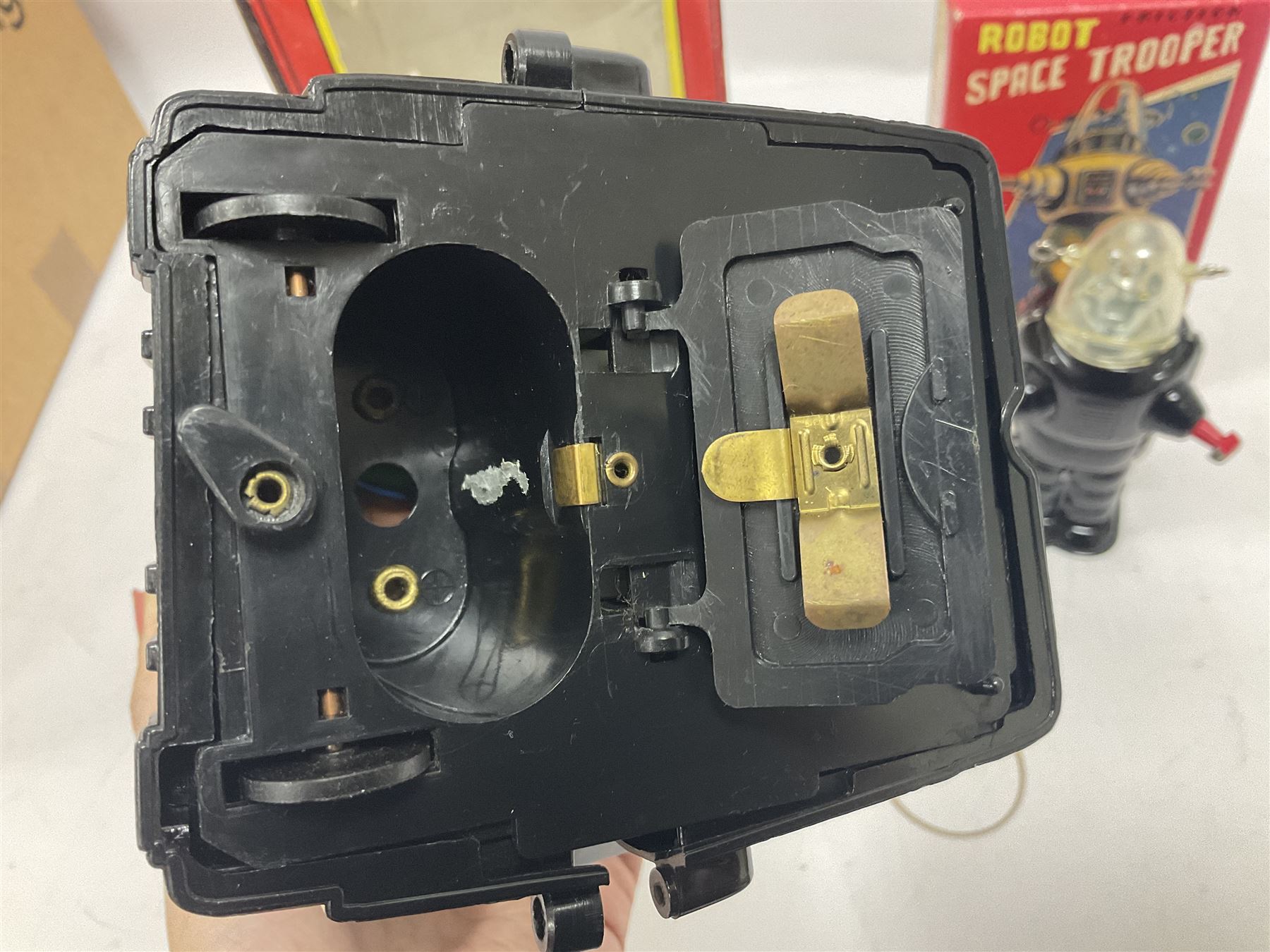 Three vintage battery operated robots comprising tin-plate Space Walk Man ME 100 Robot, Saturn the 13