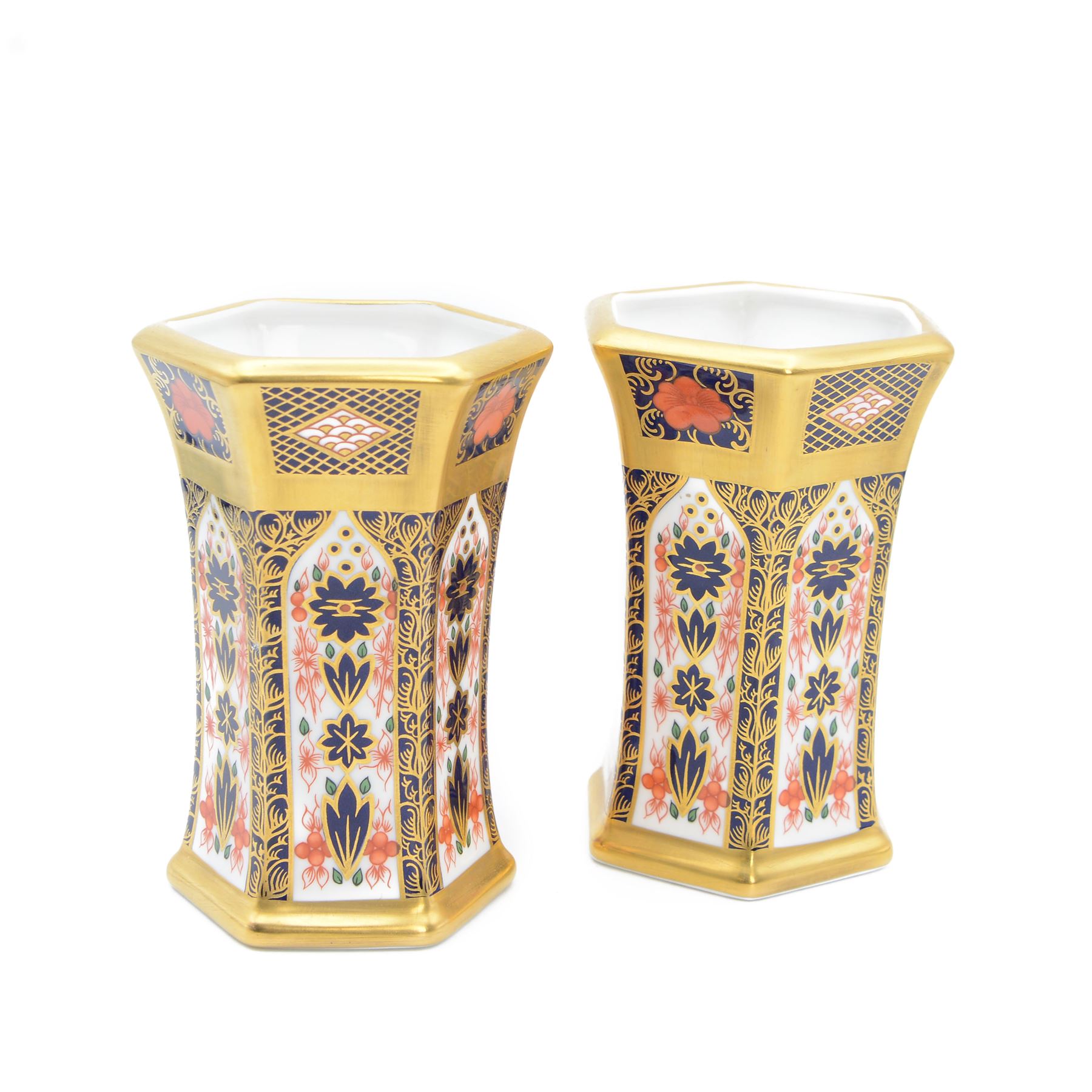 Pair of Royal Crown Derby Imari 1128 pattern vases, of hexagonal form, with printed marks beneath including year cypher 2000, H12cm