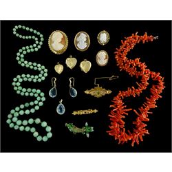  Edwardian and later jewellery including gold peridot and seed pearl brooch, three gold cameo brooches and a gold garnet and diamond brooch, all 9ct, jade bead necklace, three gilt heart locket pendants, articulated fish, coral necklace and other costume jewellery