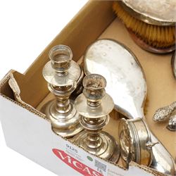 Quantity of silver items including brushes, mirror, pair of candlesticks, ring box etc