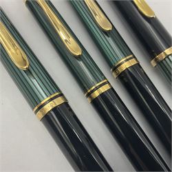 Pelikan Souveran 140 fountain pen, the green and black striped barrel with gold plated beak shaped clip and bands, with gold nib stamped 14C-585, together with matching twist ballpoint pen, push ballpoint pen and propelling pencil, largest approx L13.5cm (4)