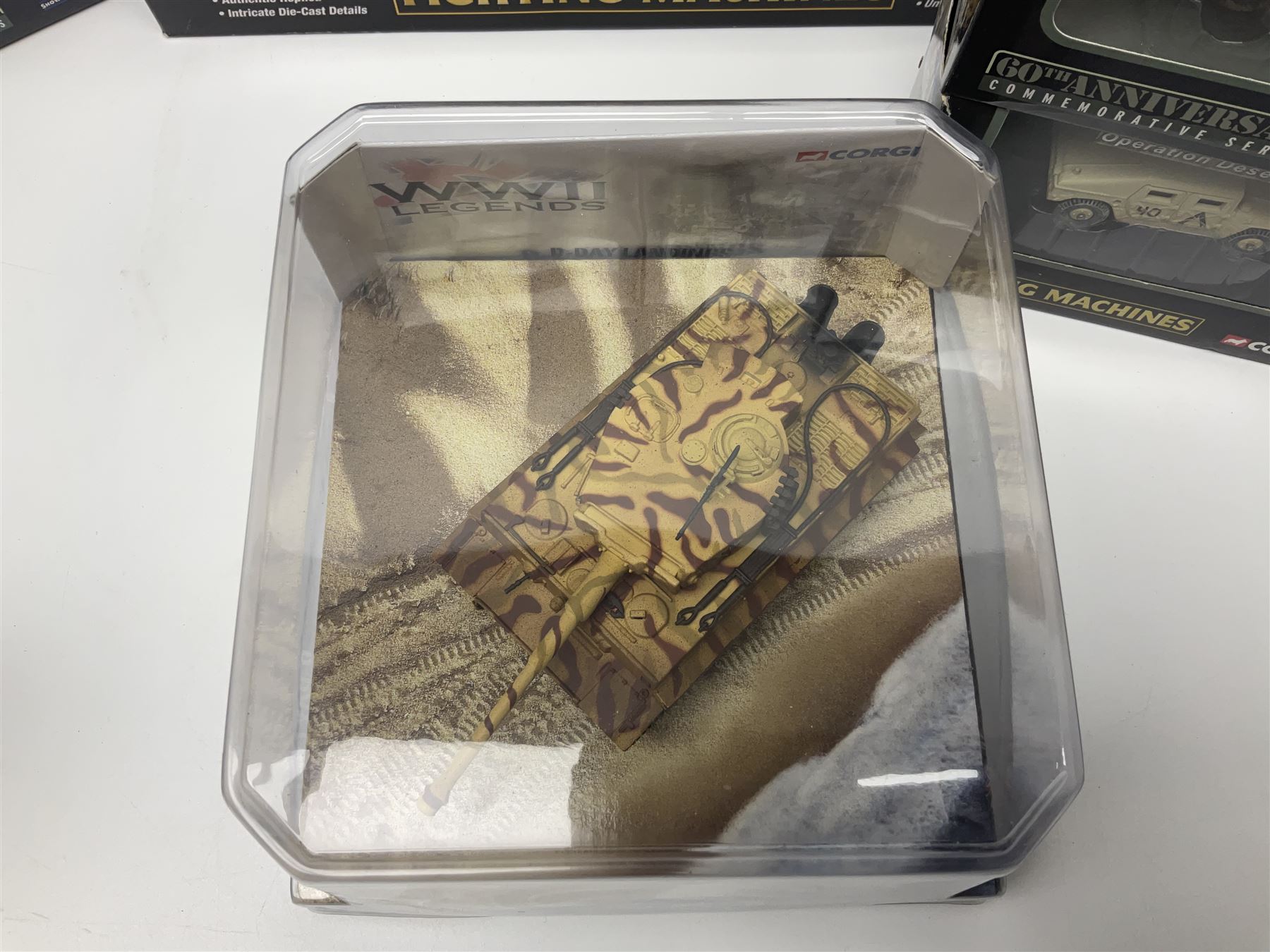 Corgi - twenty-six Showcase Collection 'Fighting Machines' for tank warfare including four-model pack, three two-model packs, WWII Legends, D-Day 60th Anniversary etc; all boxed (26)