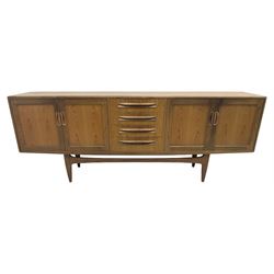 G-Plan – teak sideboard, four central drawers flanked by two double cupboards, enclosed by panelled doors 