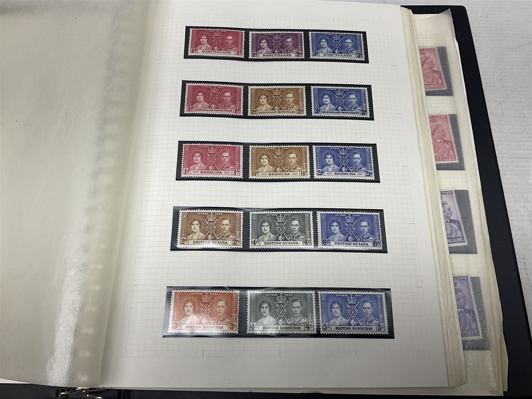 Stamps including various King George VI 12th May 1937 coronation, various 8th June 1946 Victory, various 1923-1948 Silver Wedding, Turks and Caicos Islands 'Raking Salt' mint marginal blocks of four etc, housed in two ring binder folders