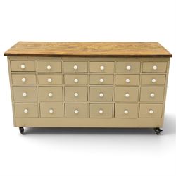 20th century haberdashery style chest, solid elm top over twenty-four assorted drawers wit...