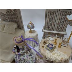 Dolls house bedroom and dressing room furniture, including beds, wardrobe, dressing table, lamps, tables, two figures and a collection of accessories