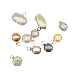 Ten sovereign holders, comprising two oval double sovereign holders and eight single sovereign holders, including brass, silver plate and gunmetal examples