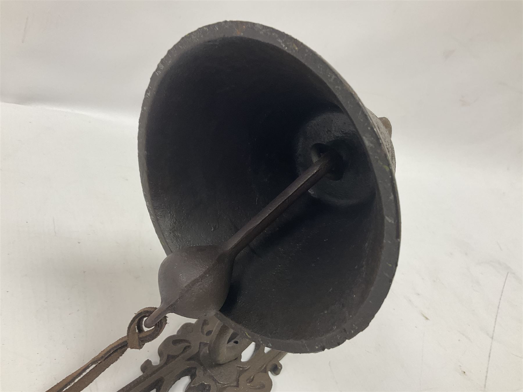 Cast iron exterior hanging garden bell with decorative butterfly bracket