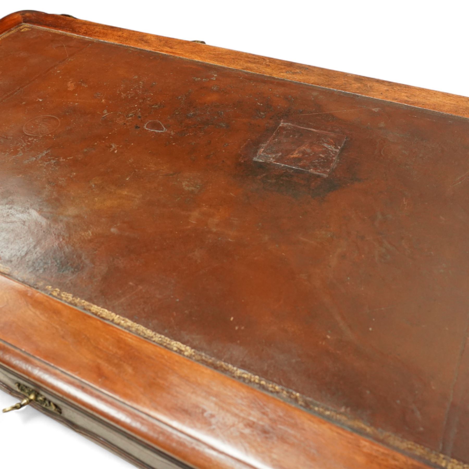 19th-century French mahogany Bureau Plat, inset tooled leather top over three frieze drawers, shaped apron, and cabriole legs carved with acanthus detail 
