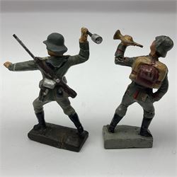 German Lineol Flak Artillery Gun on revolving base H11cm; four other Lineol WW2 German soldiers; and three Elastolin German soldiers including reclining radio operator (8)