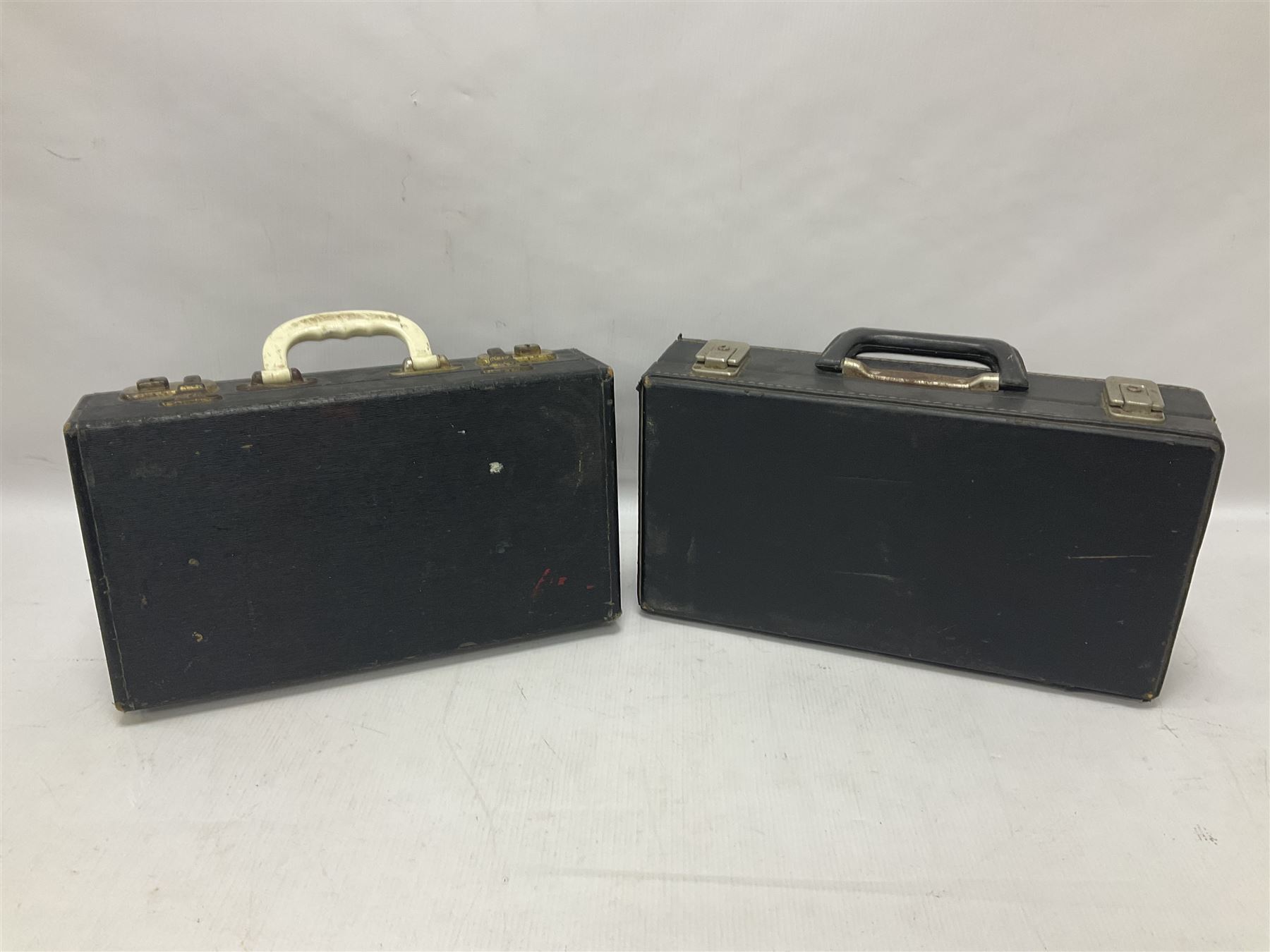 Boosey & Hawkes Regent B flat ebonite clarinet, and a French Noblet wooden intermediate clarinet
Both clarinets in their original fitted cases