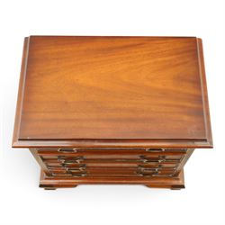 Georgian design mahogany dwarf chest, fitted with four long cock-beaded drawers, on ogee bracket feet