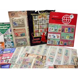 Collection of stamps including packets still mounted to the original shop cards, reading 'A Darracott Product Stamps 1d per pkt' etc, Countries include China, Spain, Argentina, Liberia, Denmark etc, in one box