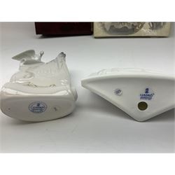 Lladro Collectors Society items, comprising of The Will to Create book, two candle holders; Sailing the Sea no 17665, Dolphins at Play no 17666, Plaque Bringing Us Together, key fob, leather wallet and a members joining pack with plaque, all in original boxes  