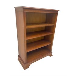 Yew wood open bookcase, fitted with adjustable shelves