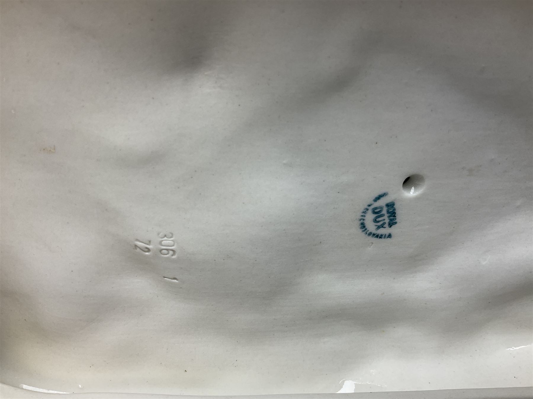 Royal Dux porcelain hunting dog with a bird, printed mark beneath, L36cm