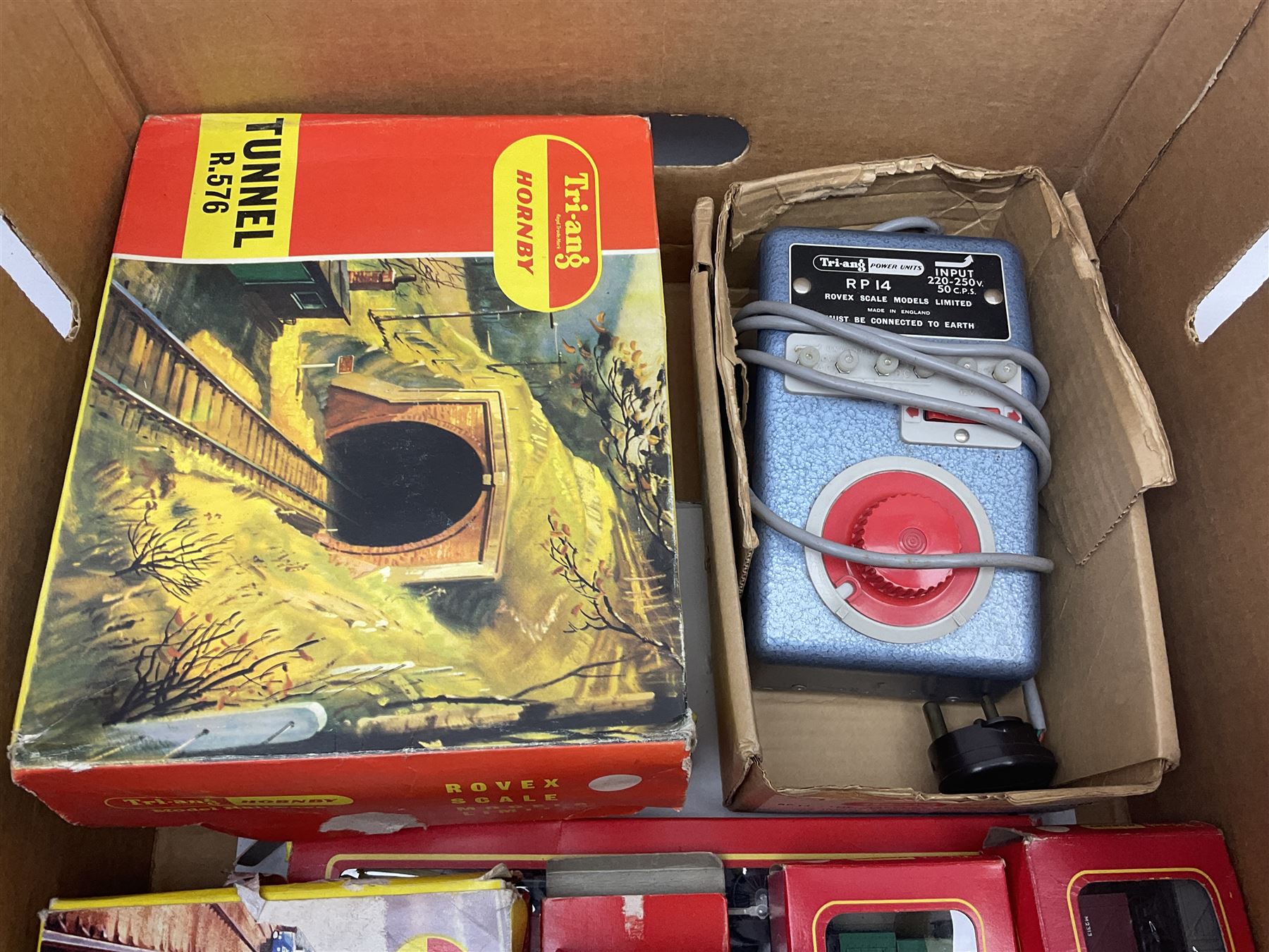 Tri-ang - quantity of '00' gauge model railway and Minic Motorways slot-racing items including Class B12 4-6-0 locomotive No.61572; boxed; seven goods wagons in five boxes; R576 Tunnel and Island Platform Set; both boxed; quantity of track and power unit; four Minic Cars and two controllers; boxed Customs Barrier and Frontier Post Set; railway car transporter and car loading ramp; quantity of track and trackside accessories; and boxed Car-Play Filling Station Set