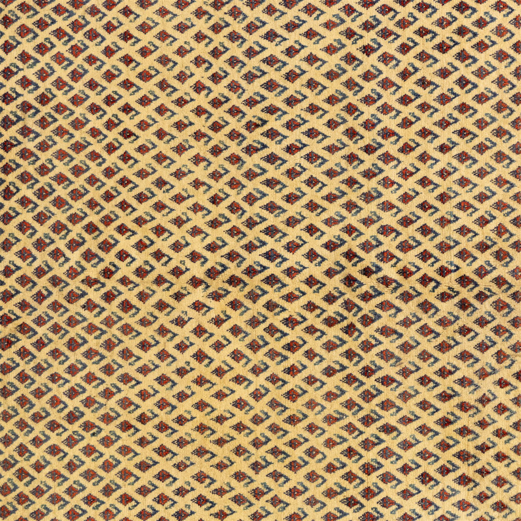 North West Persian Arak hand-knotted carpet, ivory ground densely decorated with an all-over diagonal boteh lattice design within a madder red main border of stylized rosettes and botehs between multiple narrow floral guard stripes