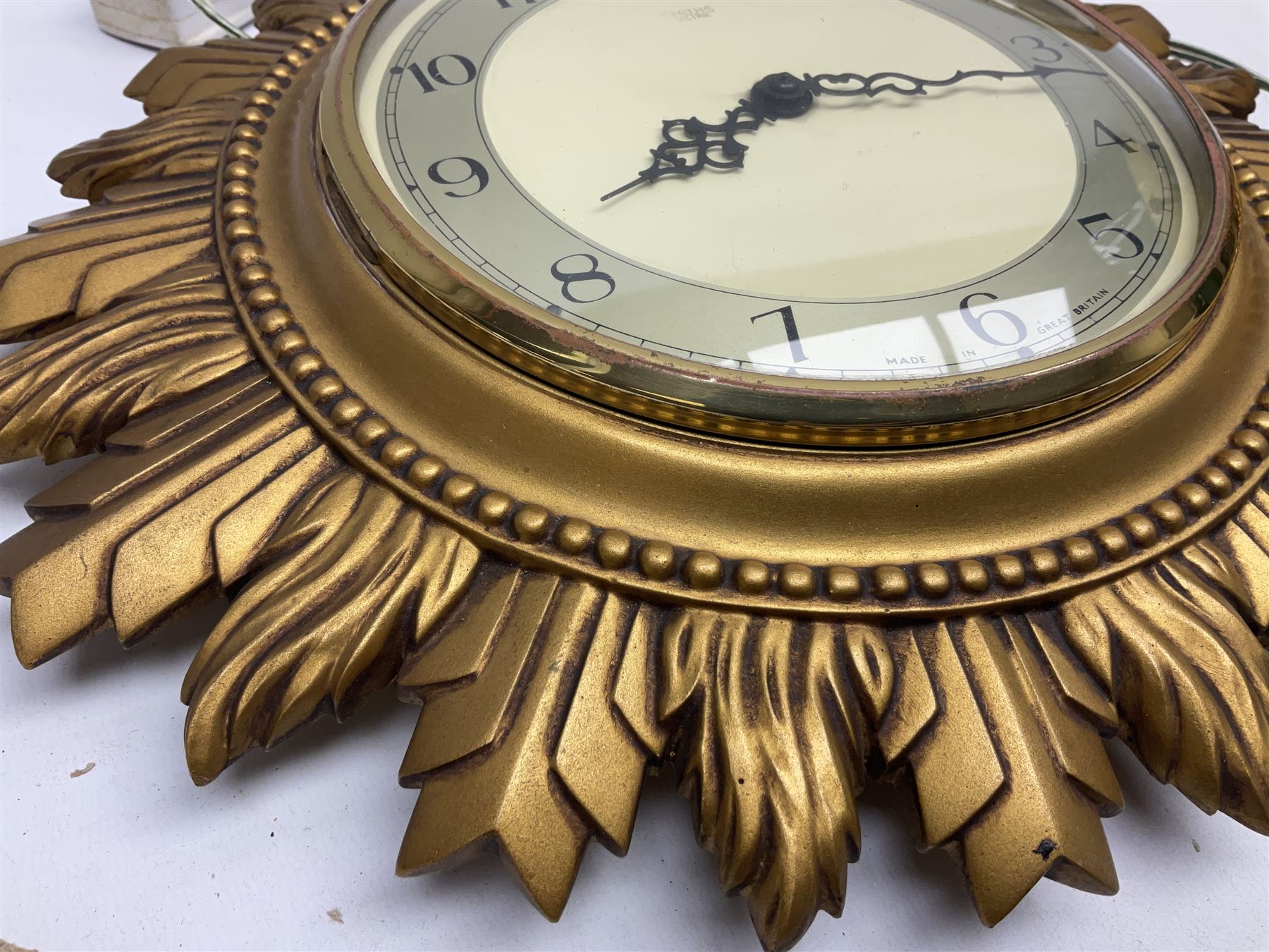 Two Smiths Sectric gilt sunburst wall clocks together Metamec Dereham wooden mantel clock, largest wall clock D35cm