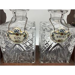Late 20th century mahogany and silver plated two cut glass decanter tantalus, marked PB&S, with Whisky and Gin Crown Staffordshire ceramic decanter labels, H32cm