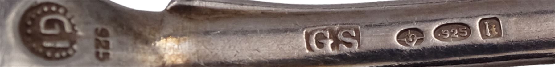 Set of six Victorian silver Fiddle Shell pattern teaspoons, hallmarked William Eaton, London 1841, together with a set of six George Jensen silver coffee spoons, hallmarked Stockwell & Co, London import 1924, 1925, 1928 and 1931, also marked with George Jensen mark circa 1910-1925, and stamped 925S, and a mid 20th century silver napkin ring, hallmarked Charles S Green & Co Ltd, Birmingham 1957, approximate total weight 7.66 ozt (238.2 grams)