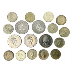 Five Queen Elizabeth II five pound coins and thirteen old style two pound coin