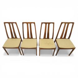 Nathan - teak drop leaf dining table and four Nathan dining chairs, the rectangular top with rounded corners fitted with twin hinged drop leaves and gate legs, extended to form an oval table 174cm in length, raised on square section supports united by stretchers, the chairs with teak frames and padded beige upholstered seat (H 96cm, W 48cm)