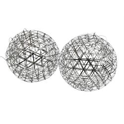 Pair polished metal spherical cage LED light fittings