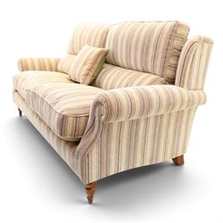 Parker Knoll - contemporary 'Henley' lounge suite comprising grande two seat sofa and wingback armchair, traditional wing shape over rolled arms and turned feet, upholstered in striped fabric
