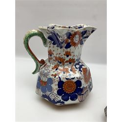 Two Masons Ironstone jugs, each in the Imari palette with serpent handles, with maker's mark beneath, tallest H24cm