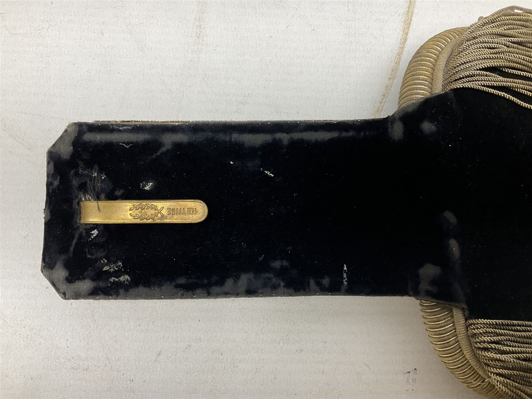 WW1 French pair of Coloniale Artillerie Epaulettes, plain gold colour, one with tassels; in open box bearing Ecole Saint Cyr label; together with WW2 French Artillery Officer's greatcoat; bears label 'P. Vauclair 40 Boul. du Montparnasse Paris (inscribed to) Mr. Babin Le 17/4/40 No.674' (2)