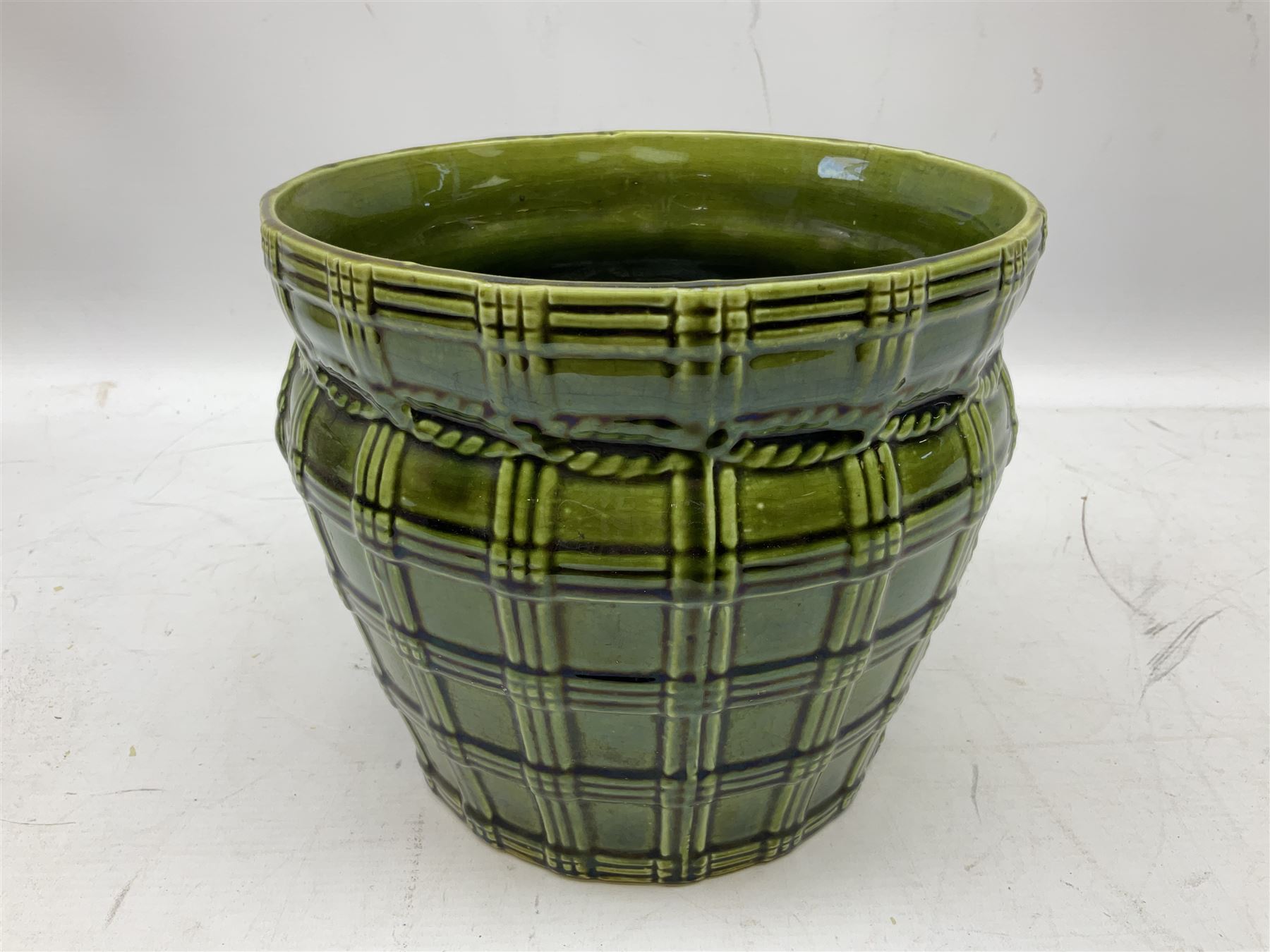 Three jardinières comprising West German Gerz example decorated in relief, Doulton Slaters example with frilled everted rim and a majolica example, and a further two Arthur Wood majolica jugs (5)