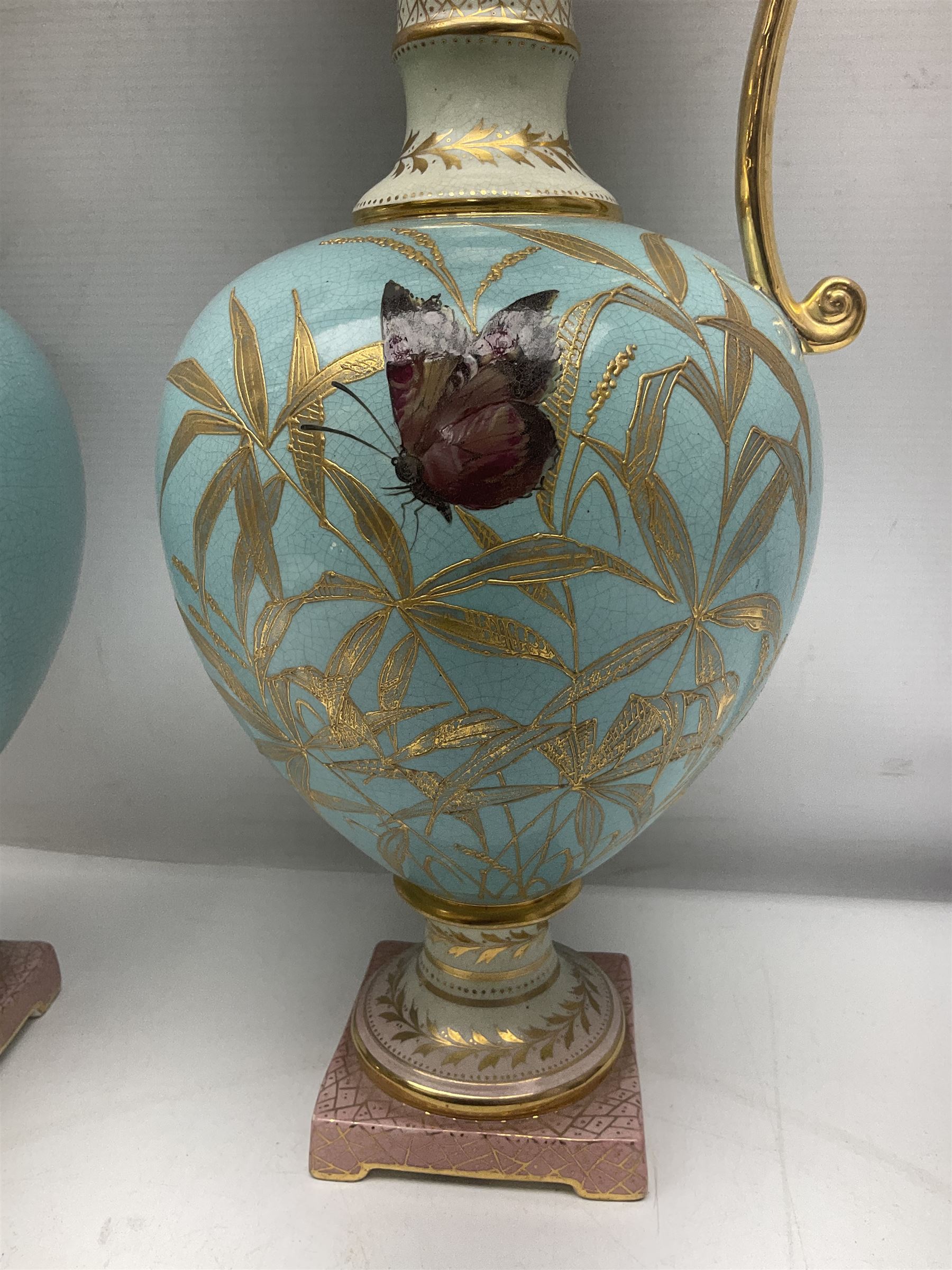 Pair rubian art pottery jugs and pair painted Doulton plates, jugs H42cm