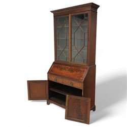 Maples & Co. Edwardian mahogany bureau bookcase, projecting moulded cornice over two astragal glazed door, panelled hinged lid over two drawers and double cupboard, on bracket feet