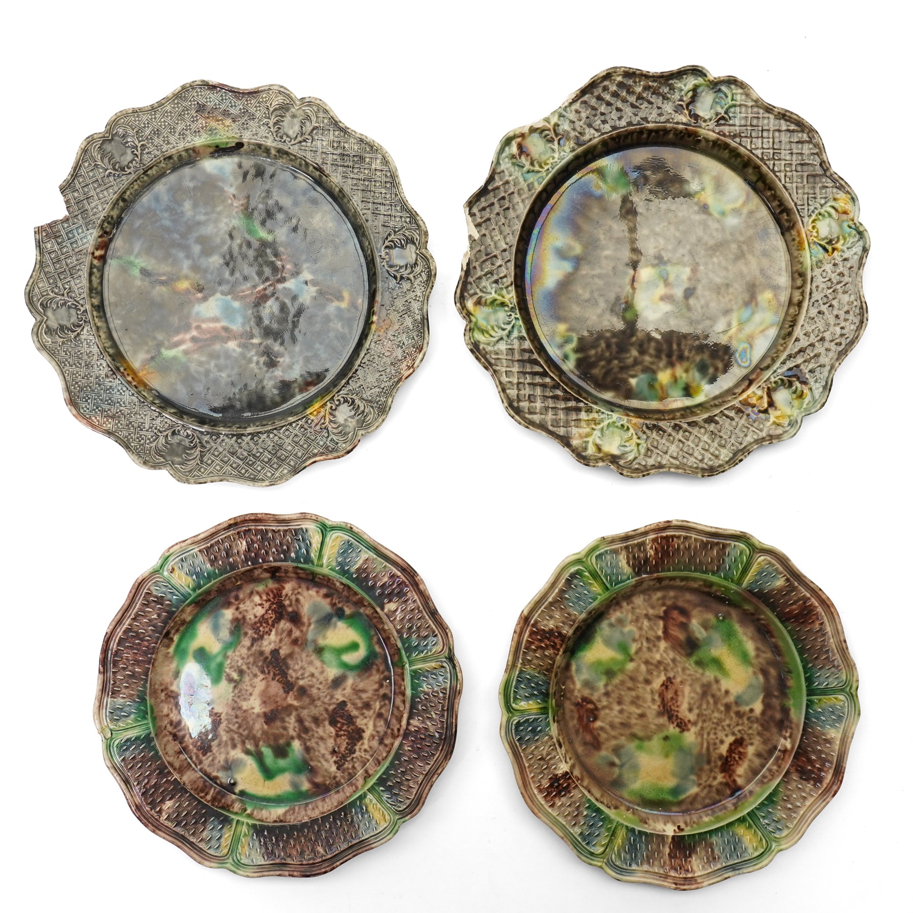 Pair of 18th century cream ware Whieldon type plates decorated with a mottled tortoiseshell glaze D20cm and two other similar plates of shaped circular design