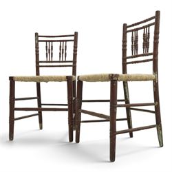 Pair of 19th century lacquered faux bamboo rush seated side chairs chairs, original blue paint under later ox-blood lacquer finish