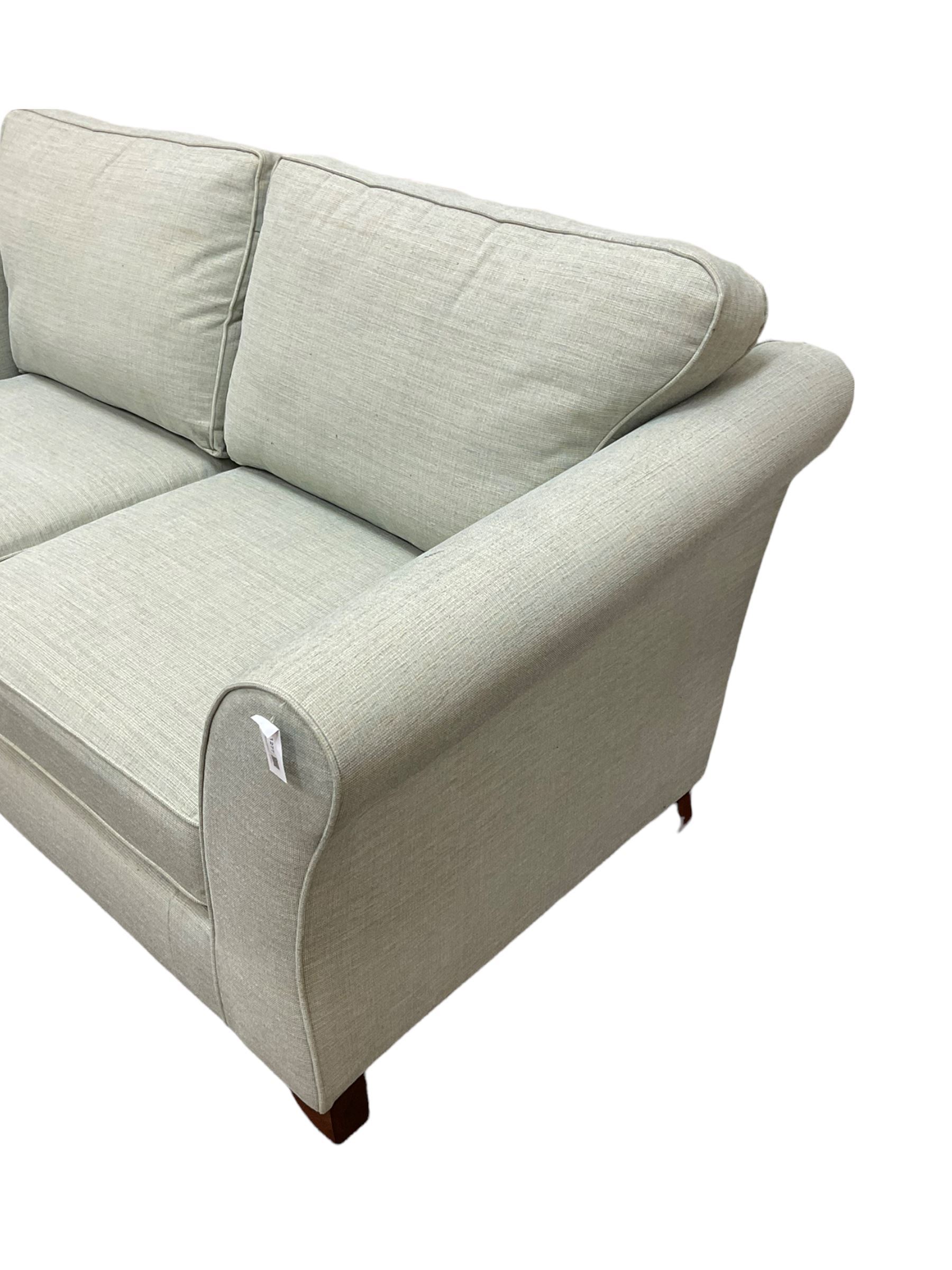 Marks & Spencer Home - two seat sofa bed, metal spring action, upholstered in light blue fabric