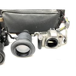 Nikon D40X digital camera, with Nikon AF Nikkor lens 28-100mm 1:3.5-5.6G, Nikon AF Nikkor lens 70-300mm 1:4-5.6G, in a Centon camera case, together with Nikon F55 digital camera and two other cases