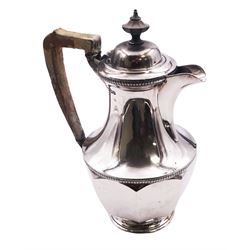 1930's silver hot water pot, of faceted baluster form with engraved dedication, and wooden handle and finial, hallmarked Harrison Brothers & Howson, Sheffield 1930, H20cm, approximate gross weight 15.66 ozt (487.2 grams)