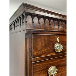 George III figured mahogany chest on chest, projecting cornice over a Gothic pointed arch arcade frieze, two short and six long graduating drawers, shaped apron and out splayed bracket feet, fitted with brass oval plate handles decorated with sphinx and pyramids, W110cm, H188cm, D58cm