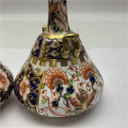 Pair of Royal Crown Derby 6299 imari pattern miniature vases, together with a miniature pitcher and dish in 2451 imari pattern, all with printed marks beneath, vase H12cm 