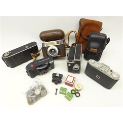  Merlin miniature camera with black crackle body, folding camera, PAT manual wind cine camera, Zeiss Ikon Contina LK 35mm camera, two other cameras and a quantity of coins  