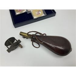 Six early 20th century fishing reels, to include wooden and brass examples, together with a leather powder flask, 1913 Christmas tin, Morgan dollar, Queen Victoria double florin and a collection of other coins, etc 