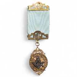 Early 20th century gold presentation Masonic jewel,  'Ashley Masonic Lodge 279', stamped 9ct, with applied silver emblem, on gilt mounted ribbon, the reverse with inscription 'Presented to John Gray 1929'