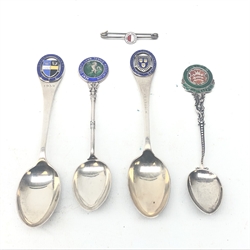  Four silver & enamel Tennis tea spoons and a 1897 Berlin Tennis brooch (5)  