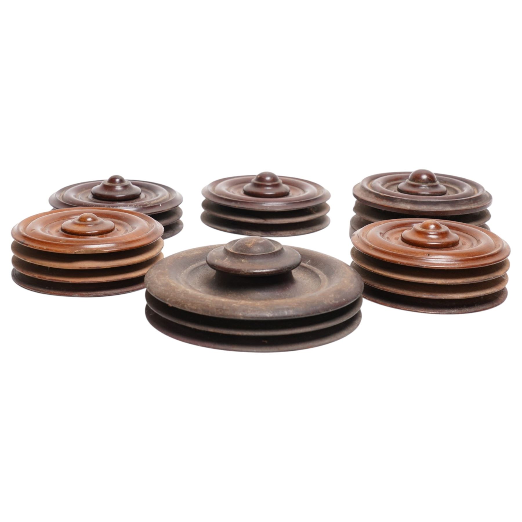 Collection of six Victorian and later mahogany double and triple whip reel holders, largest D15.5cm